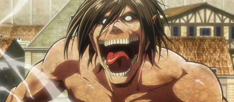 Eren Yeager in his titan form looking crazed in the city