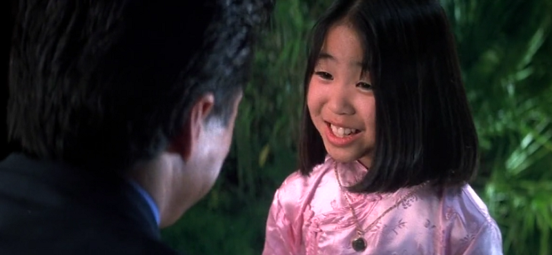 Soo Yung smiling happily towards Jackie Chan