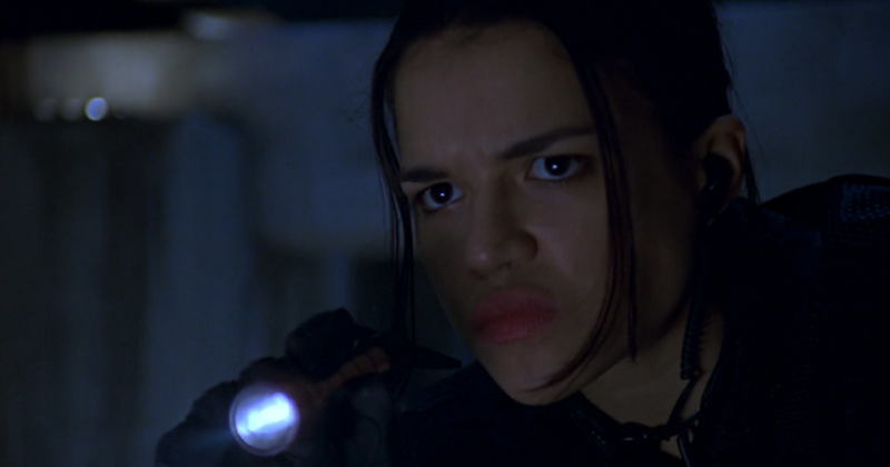 Michelle Rodriguez with a flashlight in Resident Evil