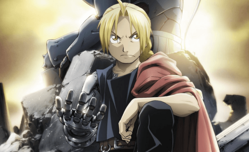 Edward Elric holding up his hand with a serious look
