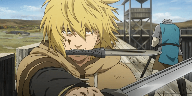 Thorfinn holding a blade in his mouth