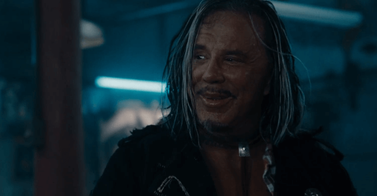 Mickey Rourke with white dreads smiling