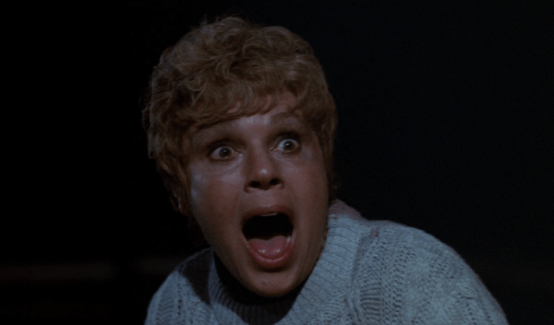 Betsy Miller as Mrs Voorhees shocked in the dark.
