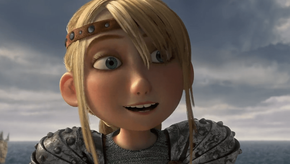 Astrid Hofferson with a leather headband and iron armor smiling happily.