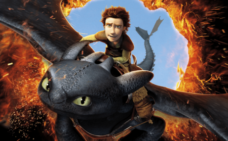 Hiccup on Toothless as they fly through a burning hole in the sky.
