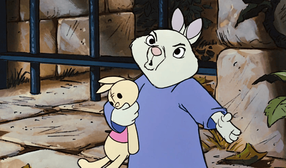 Tagalong rabbit with an overized shirt holding a bunny plushie.